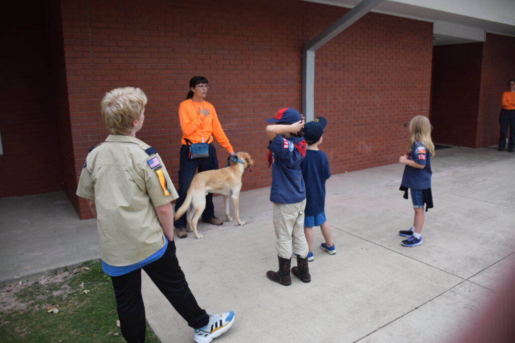 Search Dog Network member Kim is speaking to Pack 976 on First Responders Night